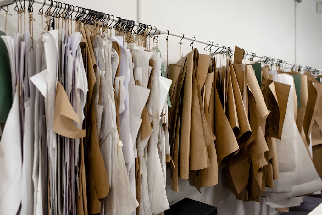 Organized sewing patterns in a fashion designer's studio, ideal for tailoring or design concepts.